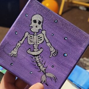 Purple Canvas Art with Skeleton Design